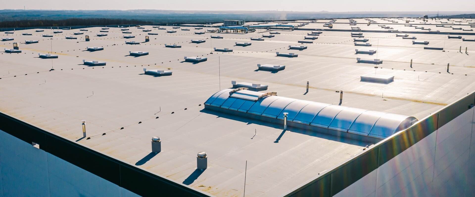 Improve the Efficiency of Your Commercial Flat Roof. Commercial Flat Roof contractors.